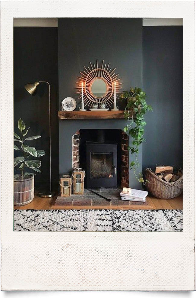 downpipe faux fireplace and window mirror fresh flowers contrast tones living room inspiration inspo home design interior trends